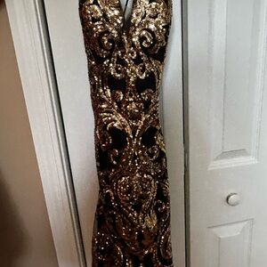 Elegant Black and Gold Sequin Gown